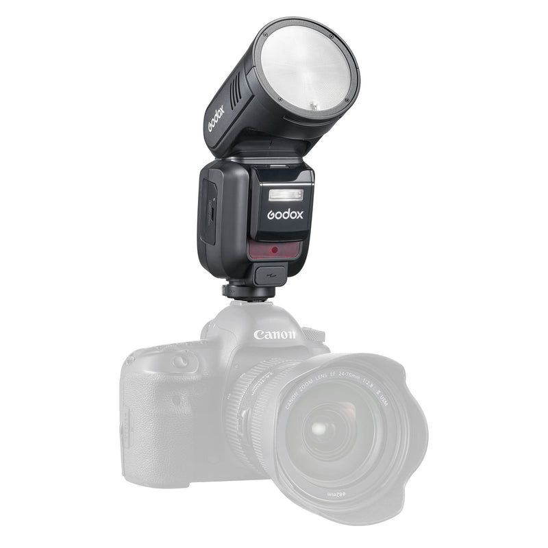 Godox V100 100Ws Round-head Speedlite Flash Mounted to a Camera