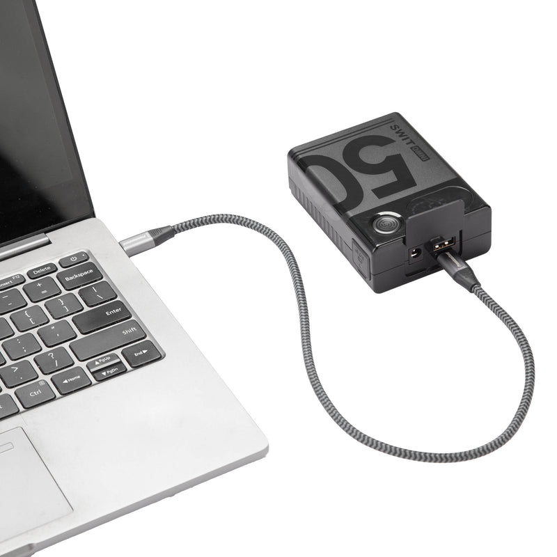 OMNI-50S 50Wh USB-C Info Pocket V-mount Battery being used to power a laptop computer